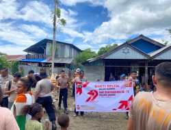 Polres Nabire Ringankan Beban Warga Terdampak Banjir Lewat Aksi Sosial dan Kerja Bakti